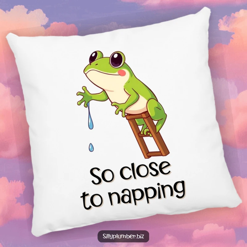 Funny Pillow featuring a frog comically stuck on a ladder, hilariously reaching for a water drip.