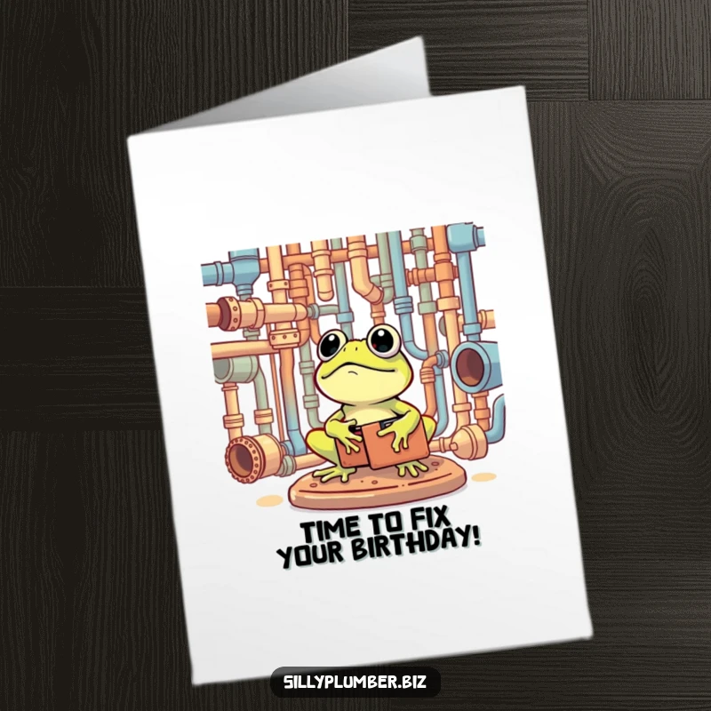 Funny Free Printable Birthday Card showing a frog with a toolbox happily surveying a complex network of pipes, ready for any job.