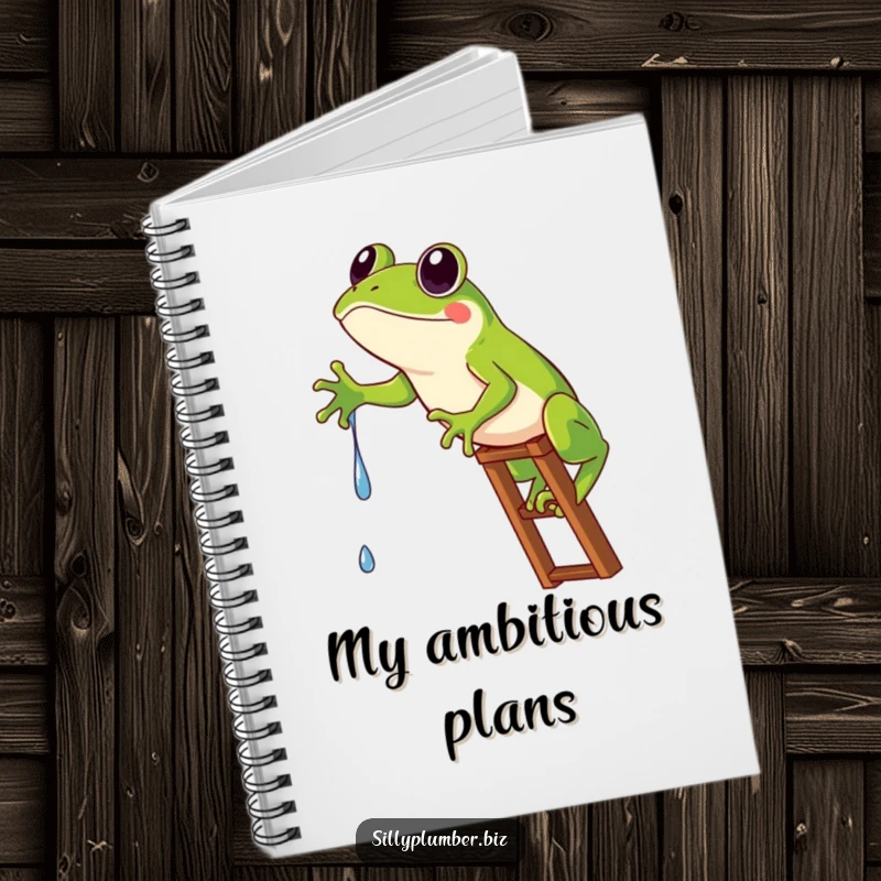 Funny Notebook showing a frog comically stuck on a ladder, reaching for a tiny water drip.