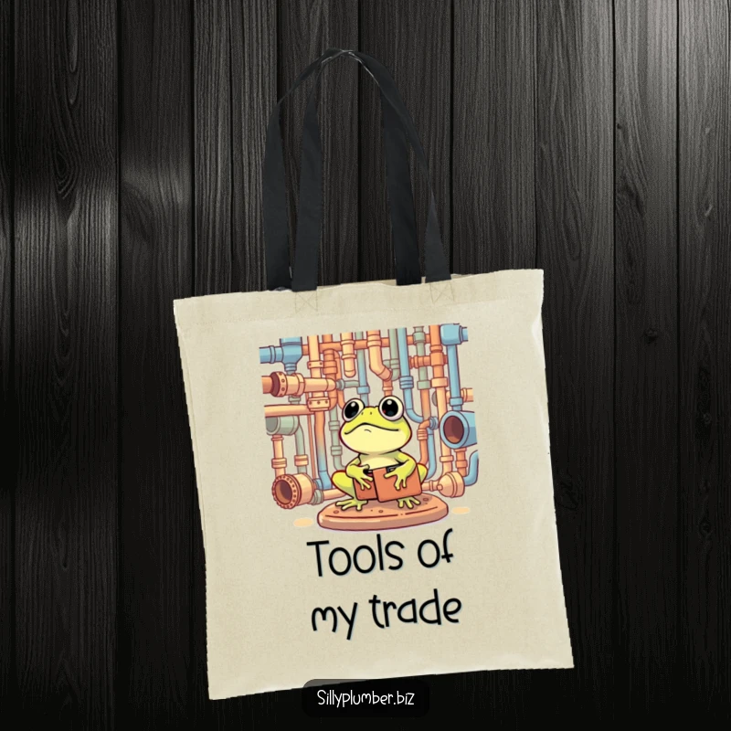 Funny Tote Bag depicting a frog with a toolbox, contentedly surveying a complex pipe network.